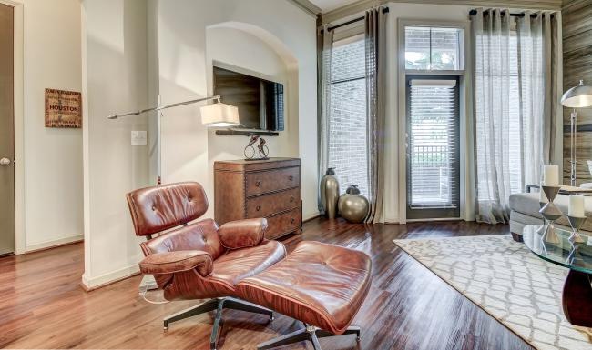a living room with a large mirror