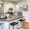 a kitchen with a marble island