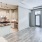 a kitchen with white cabinets
